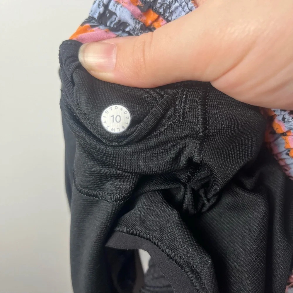 Lululemon Hotty Hot Multi Shorts size 10 tall Black Blue Orange print